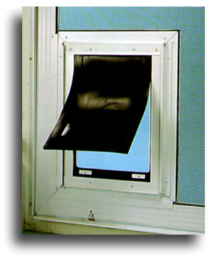 open window with a black mail delivery slot built into the frame